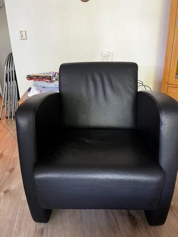 Zwarte fauteuil
