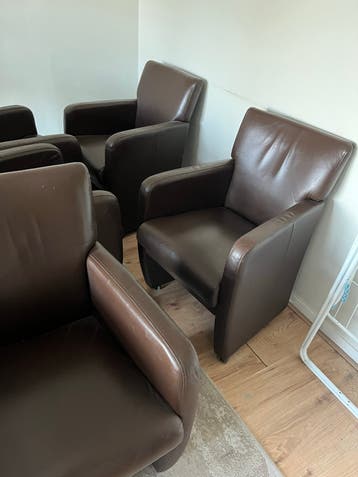 6 Bruine Leren Stoelen op wieltjes