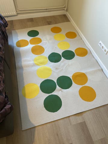 Vrolijk vloerkleed met stippen, geel, oranje, groen