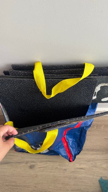 Tas met aangesneden tapijttegels