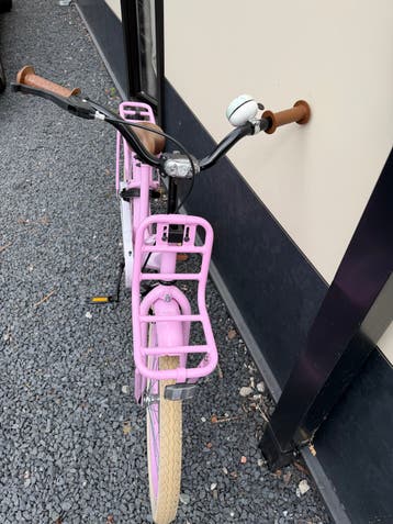 Roze kinderfiets 22 inch met voordrager