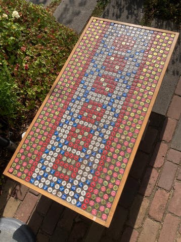 Tafelblad van bierflesdoppen