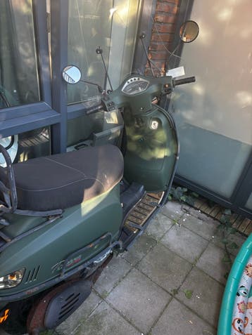 Scooter - Groen, Gebruikt