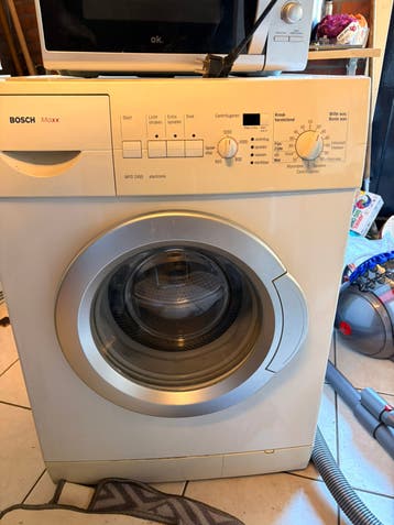 Wasmschine werkend, gratis af te halen