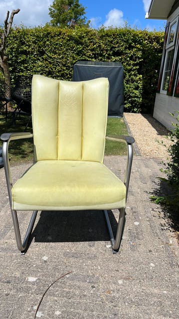 Lichtgroene leren stoel met buizenframe