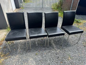 4 Zwarte Lederen Eetkamerstoelen met RVS Poten