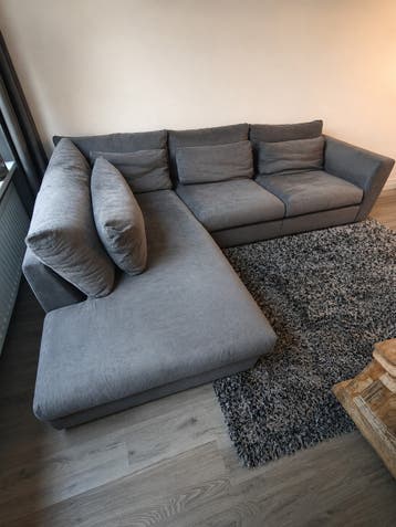 Mooie ruime grijze hoekbank – comfortabel en stijlvol

Grati