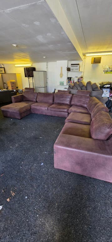 Grote hoekbank met draaifauteuil