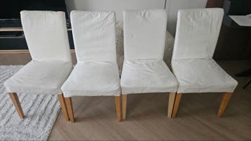4 Eetkamerstoelen met hoezen