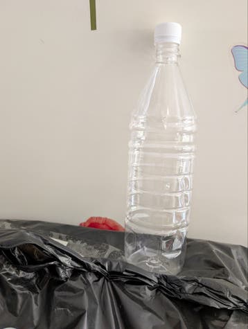 GRATIS een liter fles met dop 150 stuks