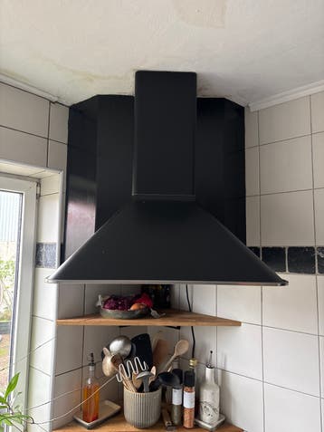 Gratis Zwarte afzuigkap met verlichting
