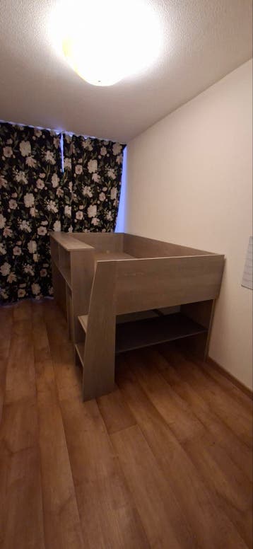 Kinderbed halfhoogslaper met opbergruimte