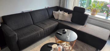 Comfortabele donkergrijze hoekbank met chaise longue