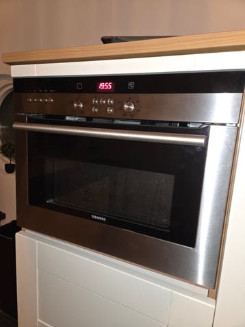 Siemens Combi-oven HB84K550N met gebarsten glas, werkt prima