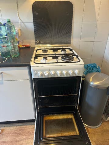 Vrijstaand Indesit gasfornuis met oven