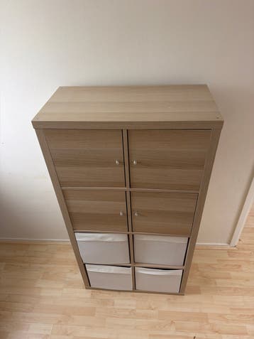 Ikea kallax kast met deuren en opbergmanden