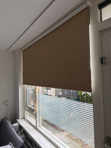 Mooi beige rolgordijn - perfect voor privacy en sfeer