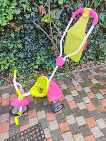 Roze/groene Smartrike driewieler met duwstang