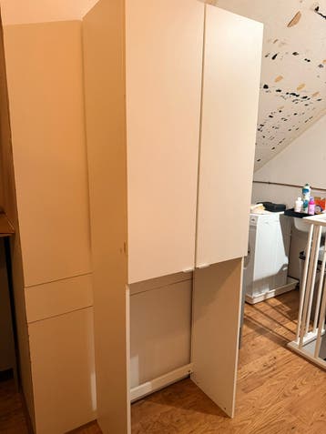 Witte wasmachinekast met opbergruimte
