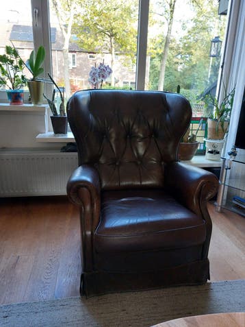 bruin leren oorstoel, gratis