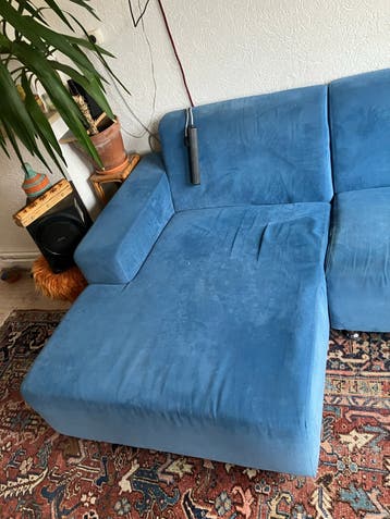 Comfortabel blauw bank onderdeel
