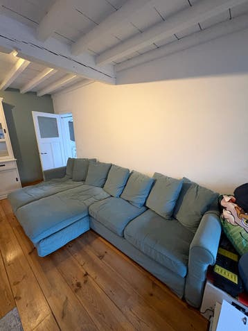 Groene IKEA bank met veel opbergruimte