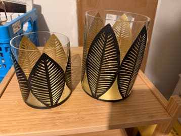 Set van 2 glazen windlichten met bladmotief