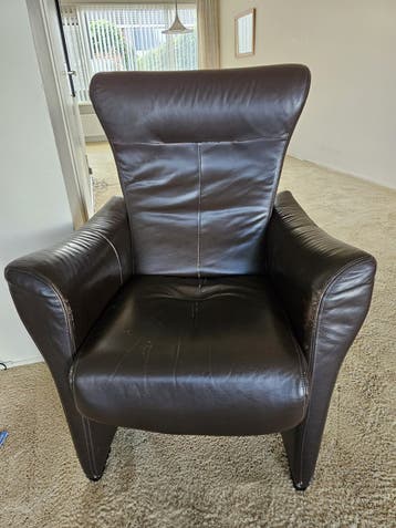 Comfortabele donkerbruine leren fauteuil