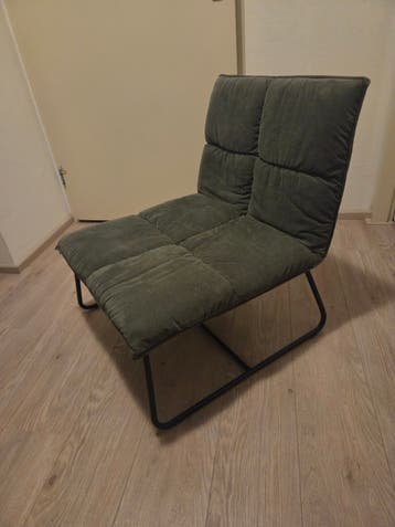 Comfortabele groene ribfluwelen loungestoel