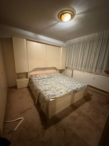 Tweepesoonsbed met ombouw kast
