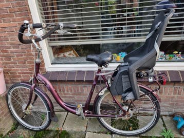 Damesfiets met kinderzitje en lage instap